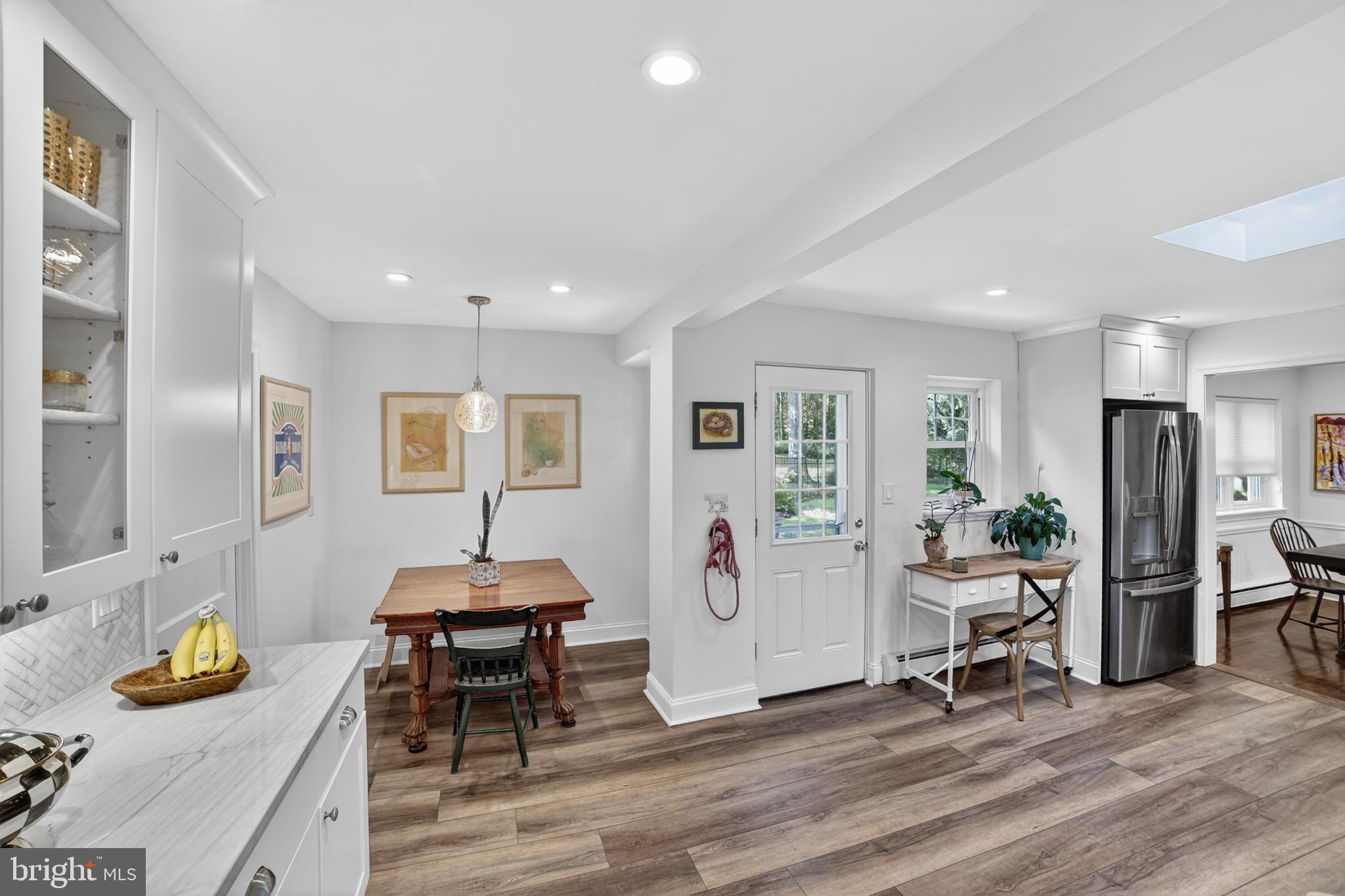 305 Irish Road Berwyn, PA 19312 - Photo 13 of 34 a room with furniture and wooden floor