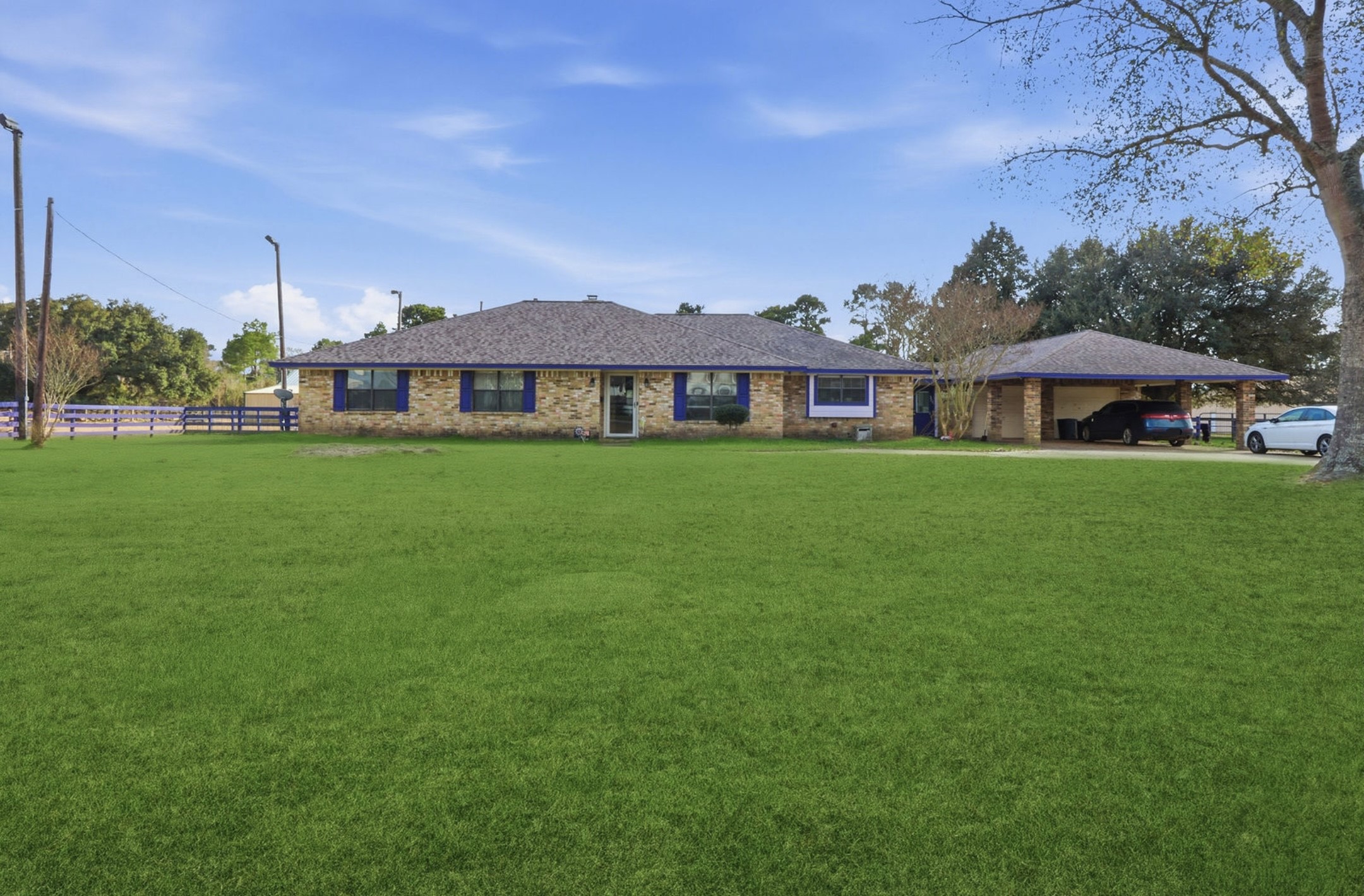 a view of a house with a big yard