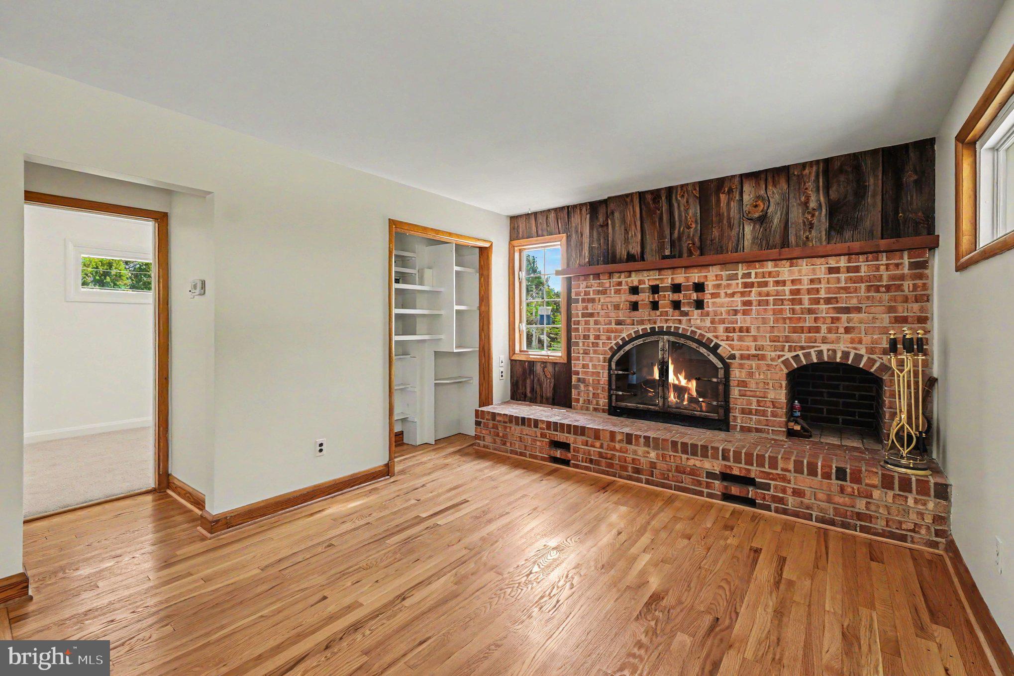 9204 Snyder Lane Perry Hall, MD 21128 - Photo 6 of 42 a view of fireplace with wooden floor