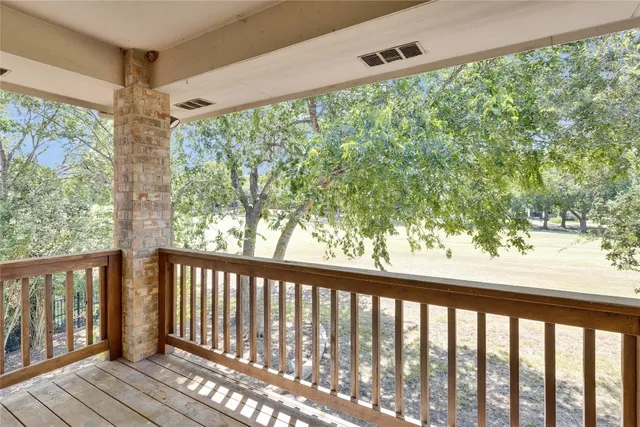 a view of a porch with a yard