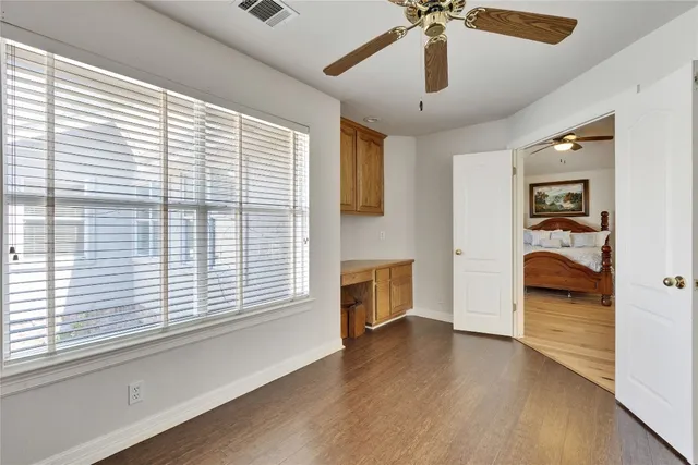 a view of a livingroom with furniture and a window