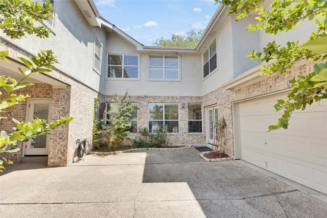 a house view with a outdoor space