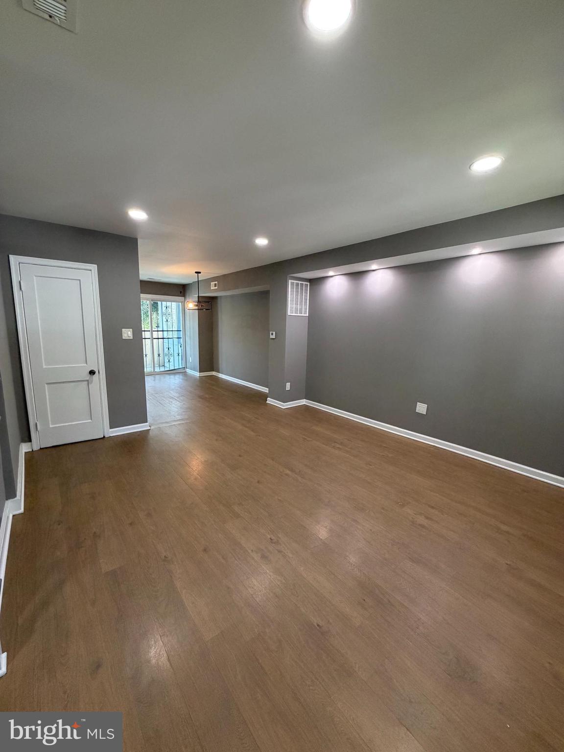 1353 Cambria Street Baltimore, MD 21225 - Photo 4 of 23 a view of an empty room