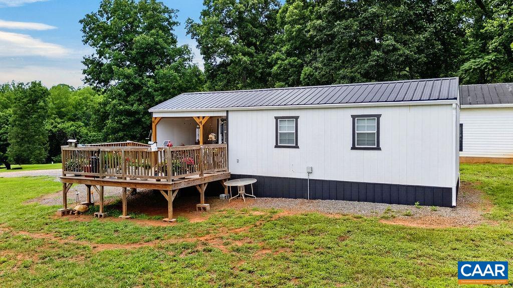 965 Horseshoe Road Arrington, VA 22922 - Photo 47 of 69 A charming guest cottage offers its own septic system, water service, Wi-Fi, heating and air conditioning, along with a lovely deck and covered front porch—ideal for guests, extended family, a home office, or a private studio.