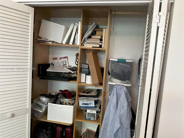 a view of a workspace with furniture