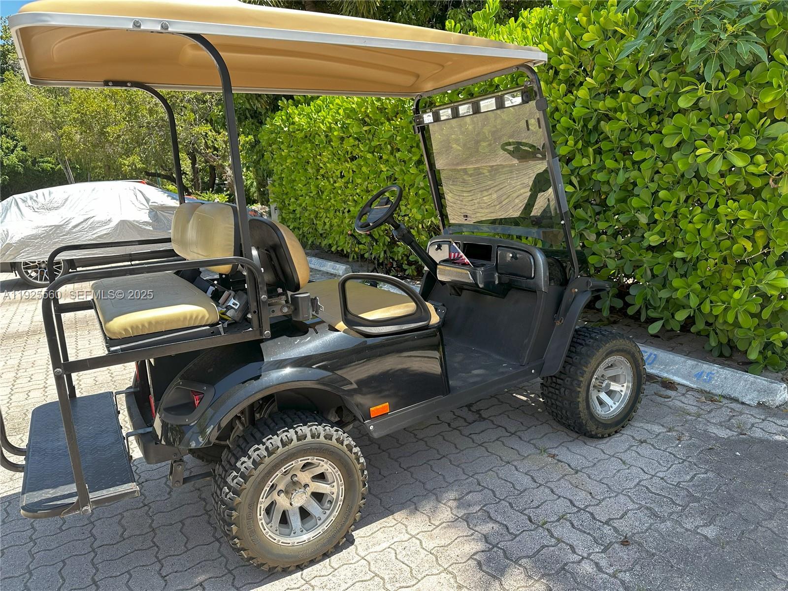 55 Ocean Ln Drive, Unit 4020 Key Biscayne, FL 33149 - Photo 55 of 57 a car parked in front of a house