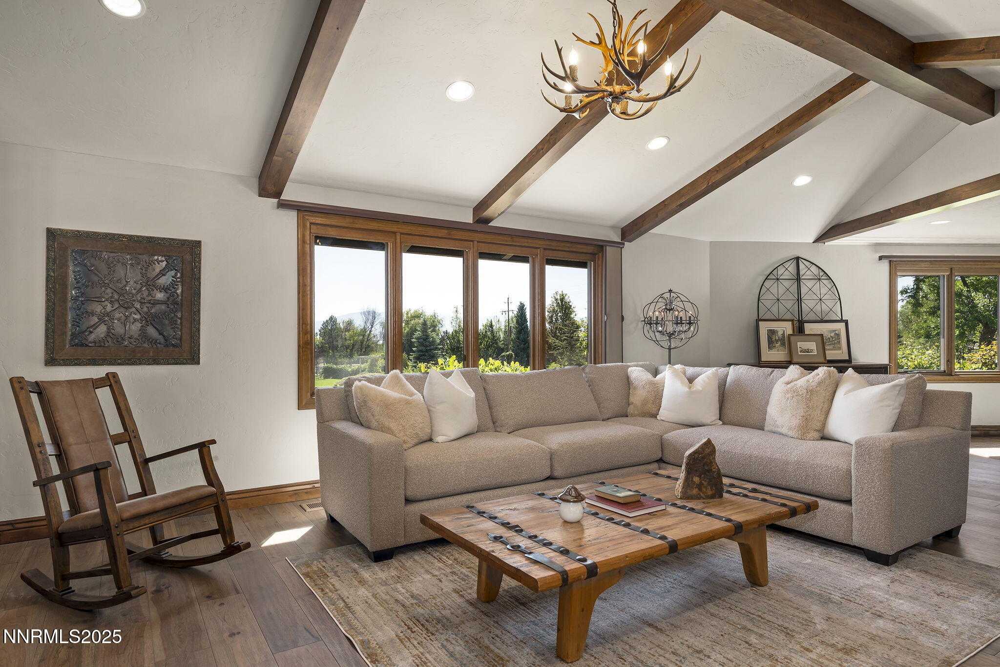 3405 Lone Tree Lane Reno, NV 89511 - Photo 11 of 80 a living room with furniture and a large window