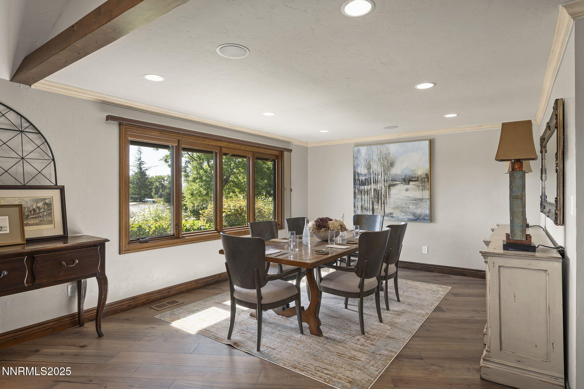 3405 Lone Tree Lane Reno, NV 89511 - Photo 14 of 80 a view of a dining room with furniture window and outside view