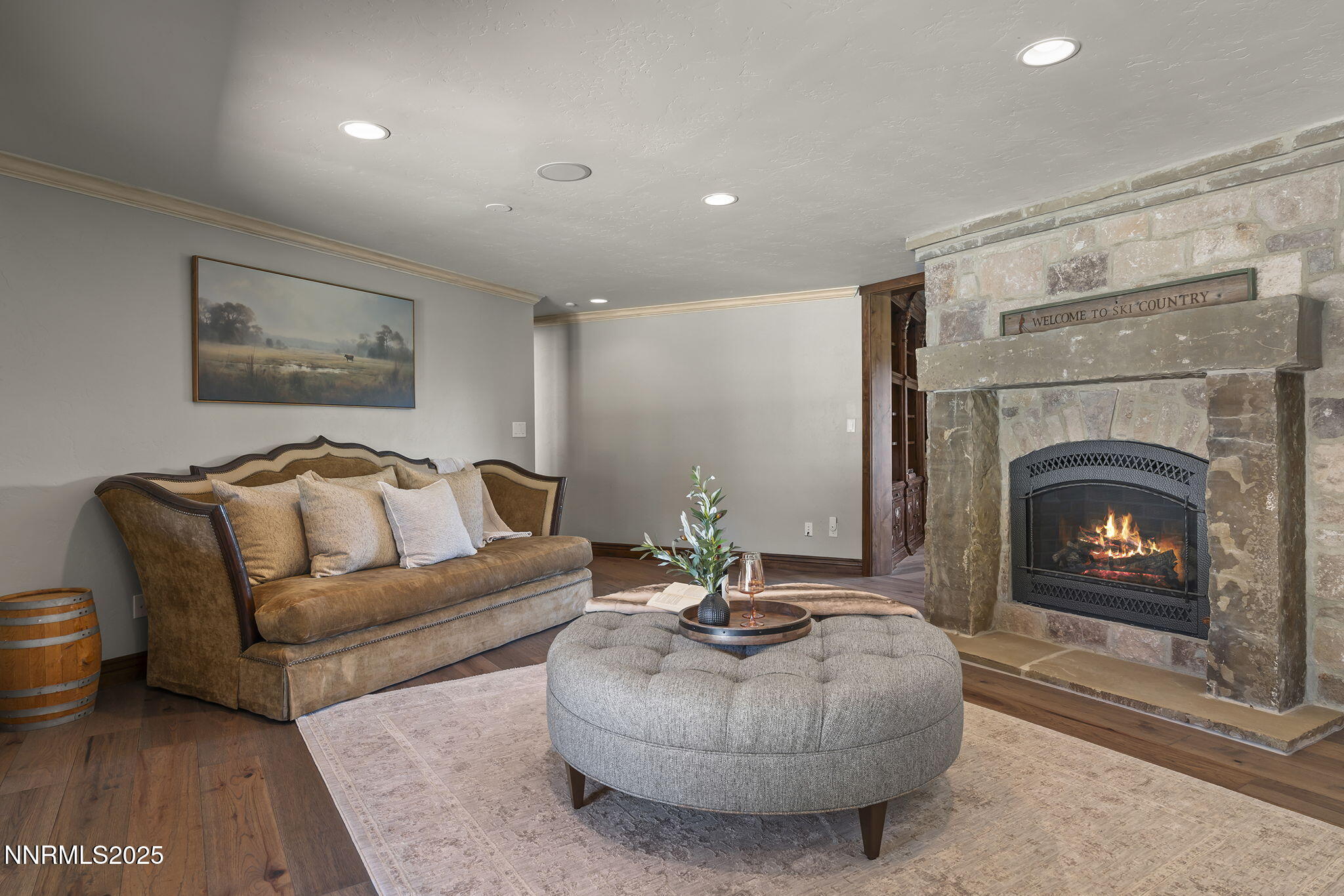 3405 Lone Tree Lane Reno, NV 89511 - Photo 23 of 80 a living room with furniture and a fireplace