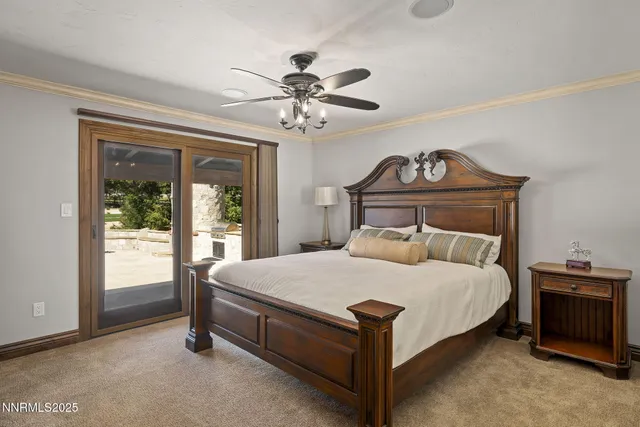 a view of walk in closet and bedroom