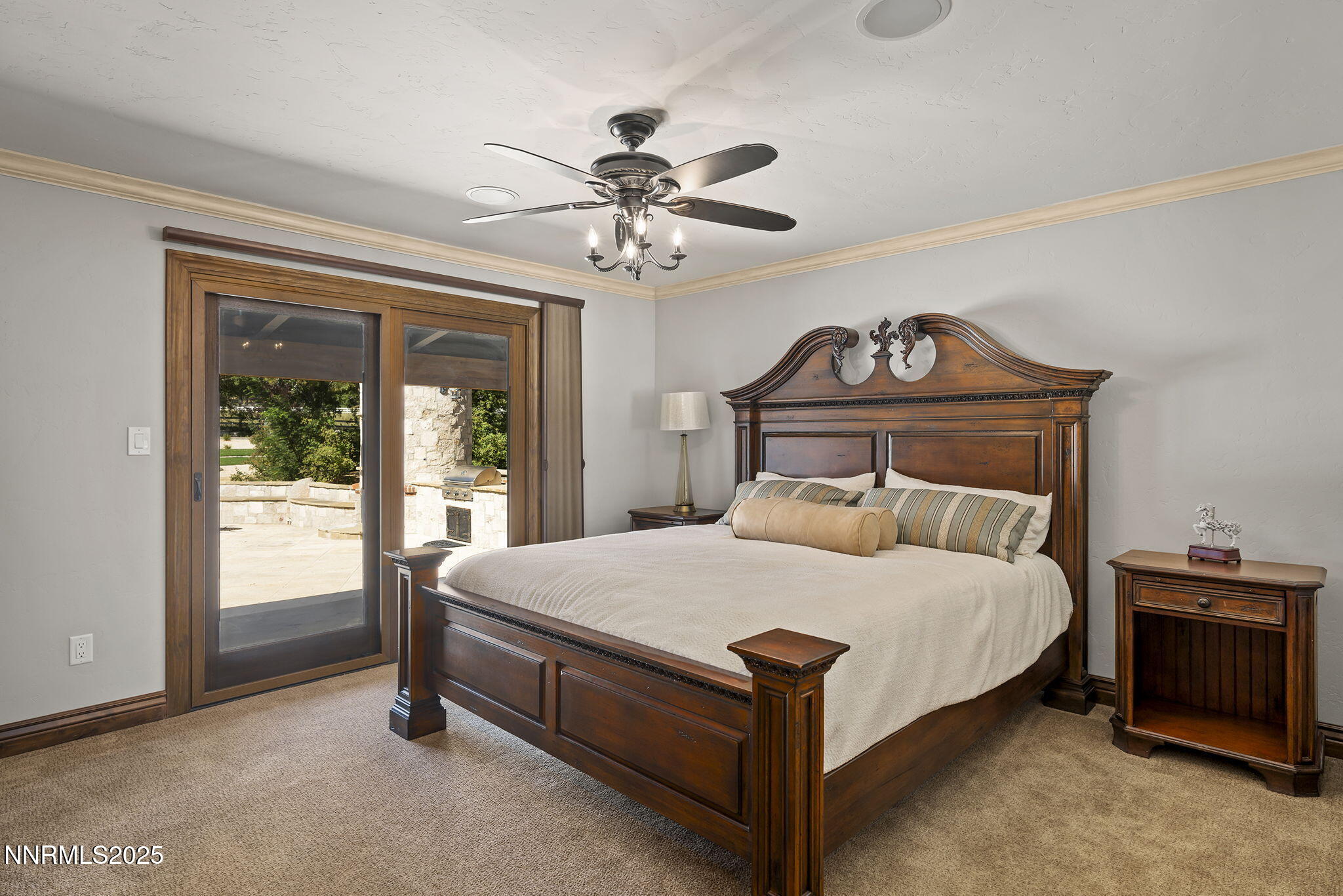 3405 Lone Tree Lane Reno, NV 89511 - Photo 24 of 80 a bedroom with a bed and a large window