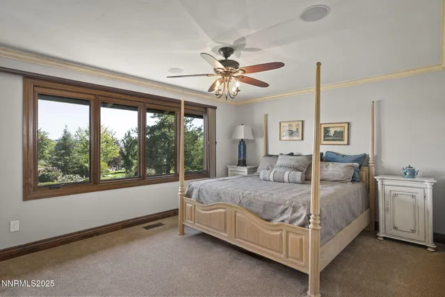 a bathroom with a granite countertop tub sink and mirror