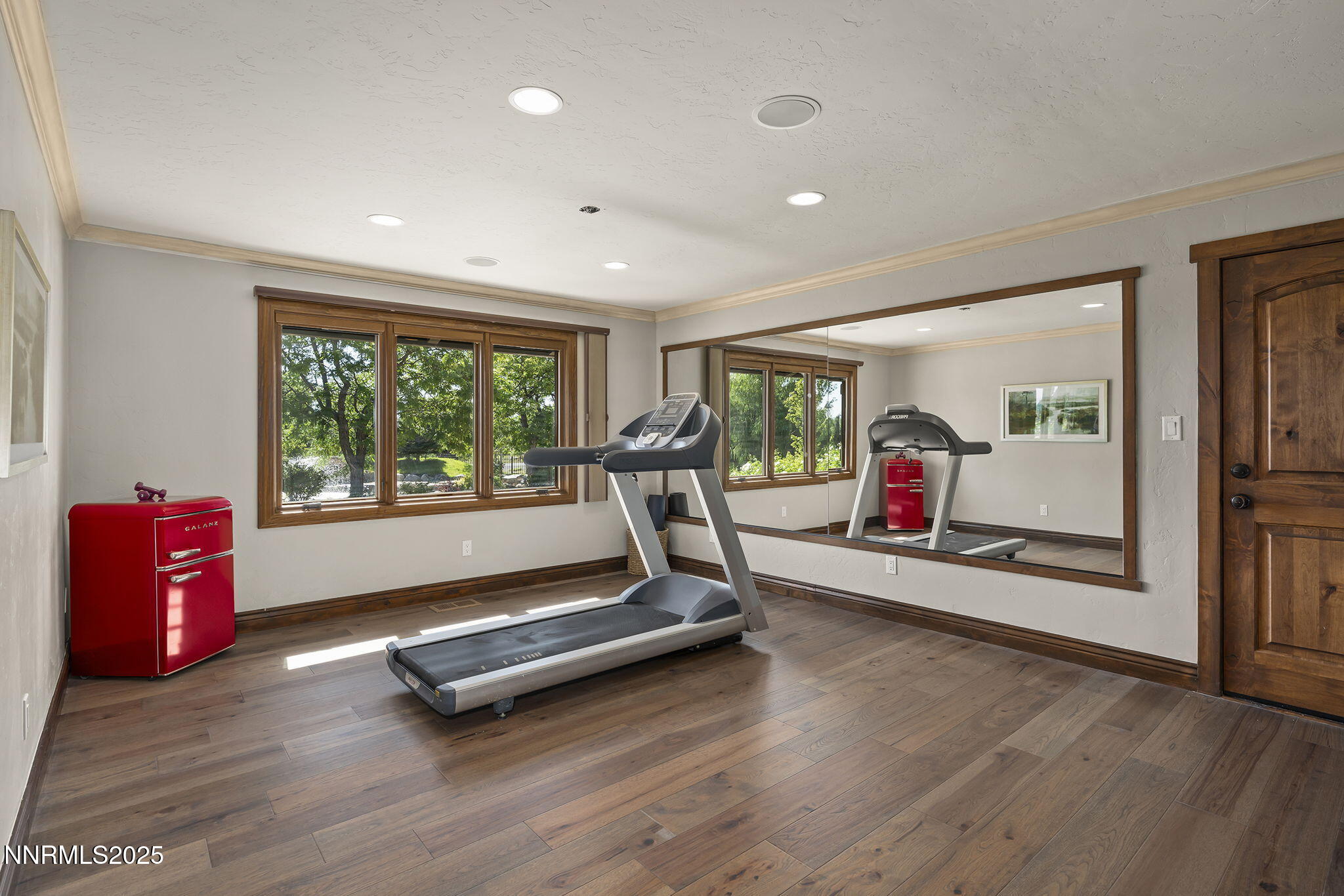 3405 Lone Tree Lane Reno, NV 89511 - Photo 29 of 80 a view of a room with gym equipment and a large window