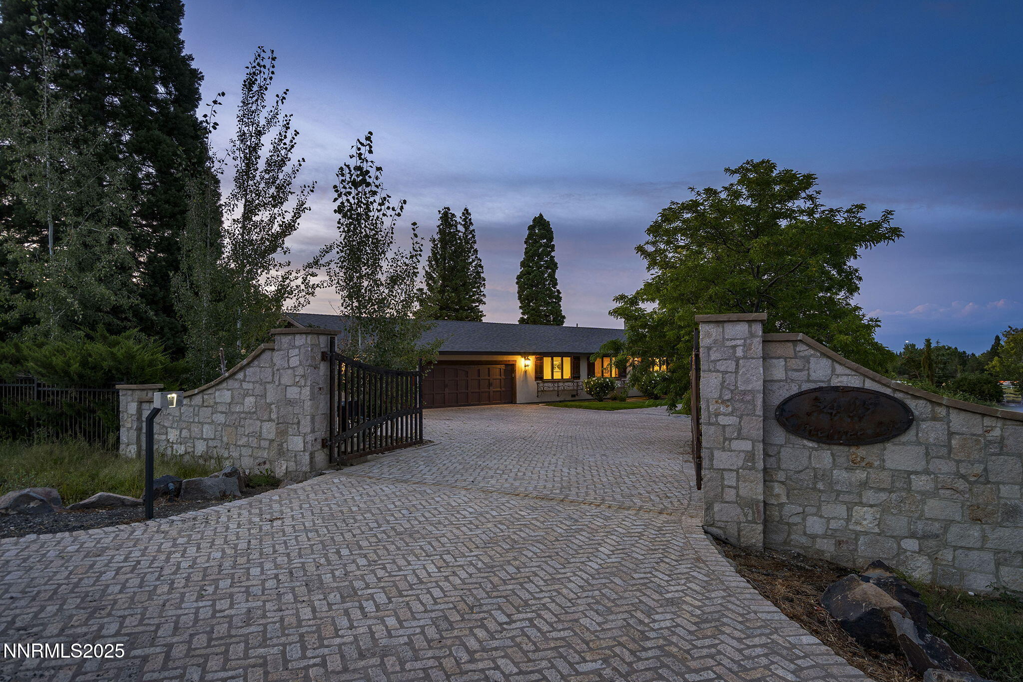 3405 Lone Tree Lane Reno, NV 89511 - Photo 3 of 80 a view of a house with a yard and potted plants