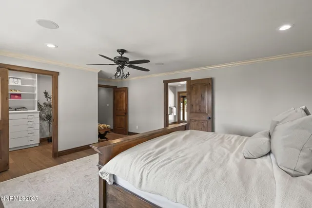 a kitchen with stainless steel appliances granite countertop a refrigerator sink and stove