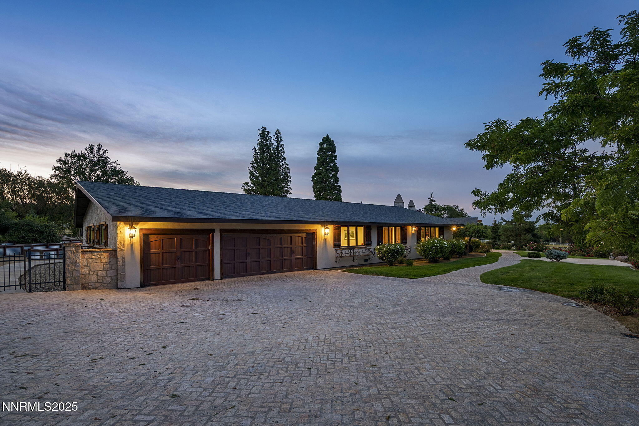 3405 Lone Tree Lane Reno, NV 89511 - Photo 4 of 80 a view of a house with a yard and garage