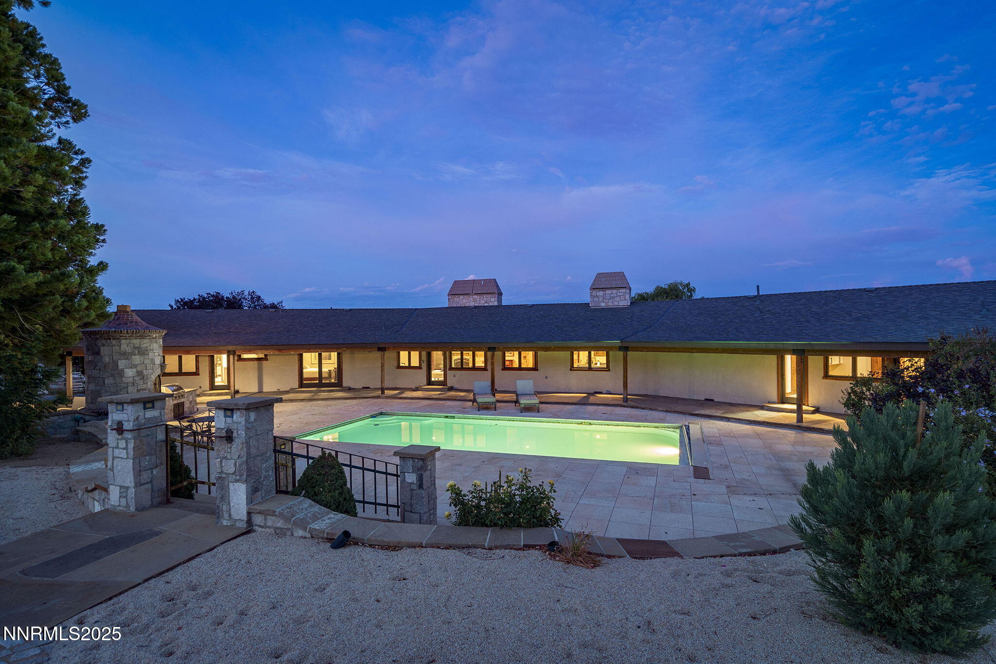 3405 Lone Tree Lane Reno, NV 89511 - Photo 49 of 80 a view of a swimming pool with an outdoor seating and a yard