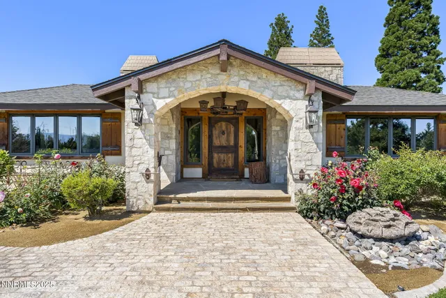 a living room with furniture and a gym