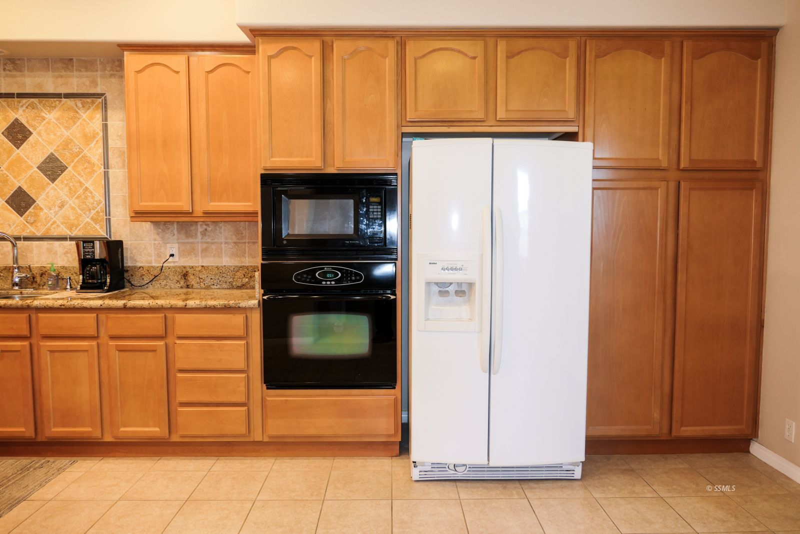 120 West Franklin Avenue Ridgecrest, CA 93555 - Photo 15 of 49 a kitchen with stainless steel appliances a refrigerator and cabinets