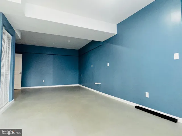 a view of a chairs on the roof deck