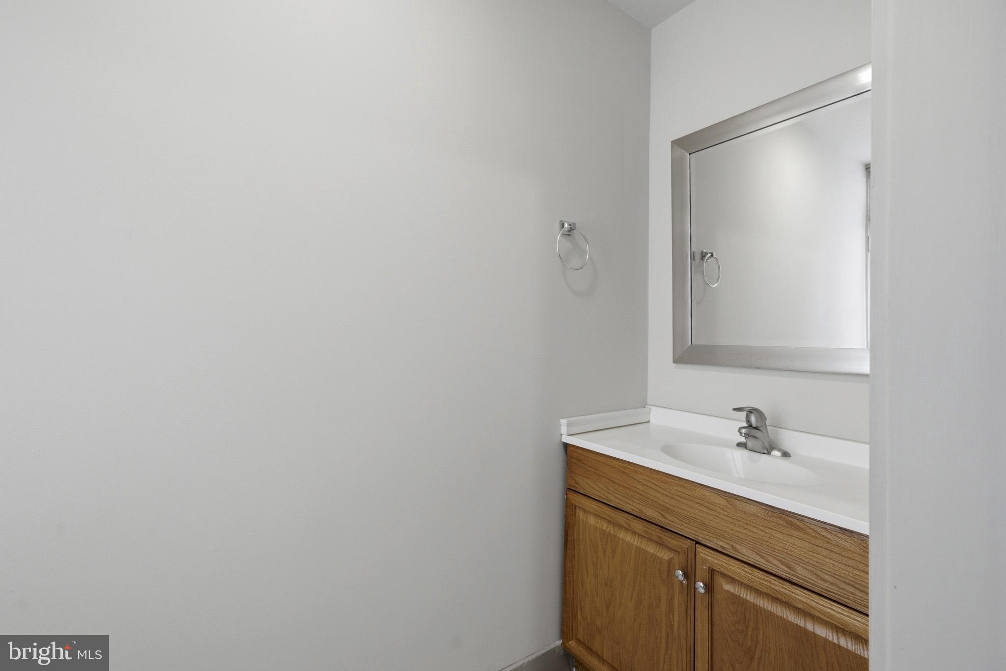 131 West Middle Street Gettysburg, PA 17325 - Photo 16 of 47 a bathroom with a sink and a mirror