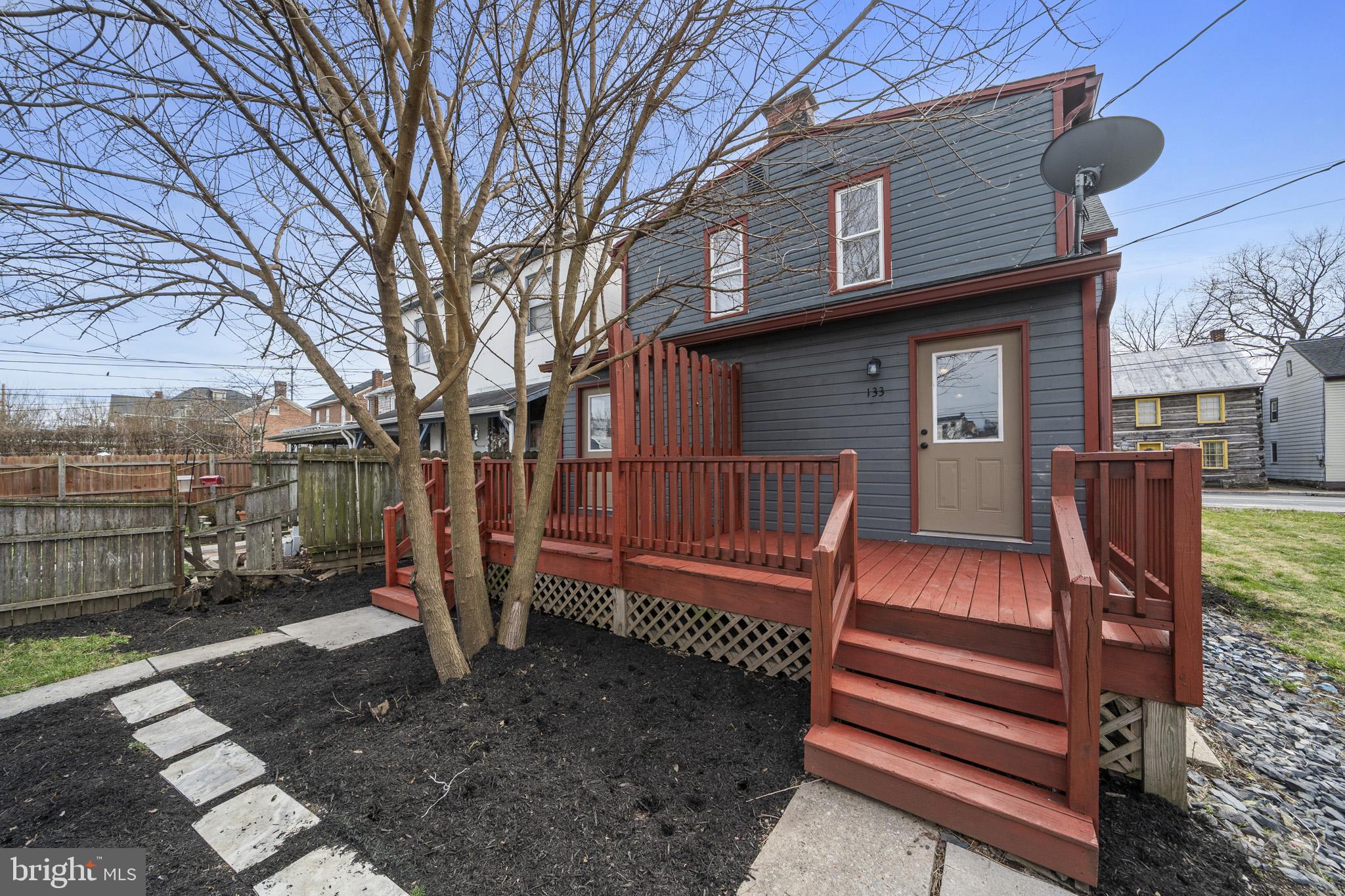 131 West Middle Street Gettysburg, PA 17325 - Photo 28 of 47 a view of a wooden deck with a yard