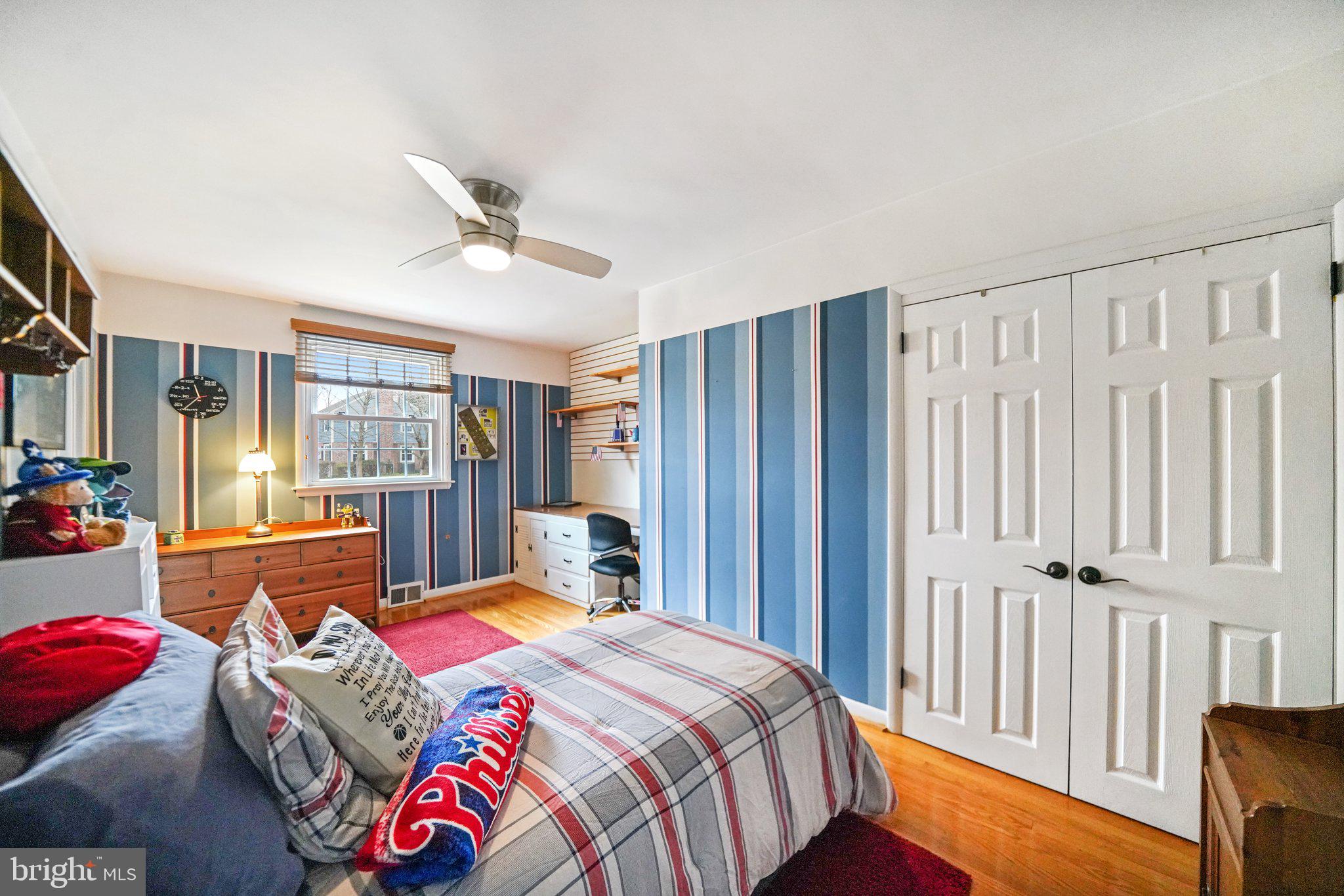 487 Kerr Lane Springfield, PA 19064 - Photo 20 of 48 a bedroom with a bed and a chandelier