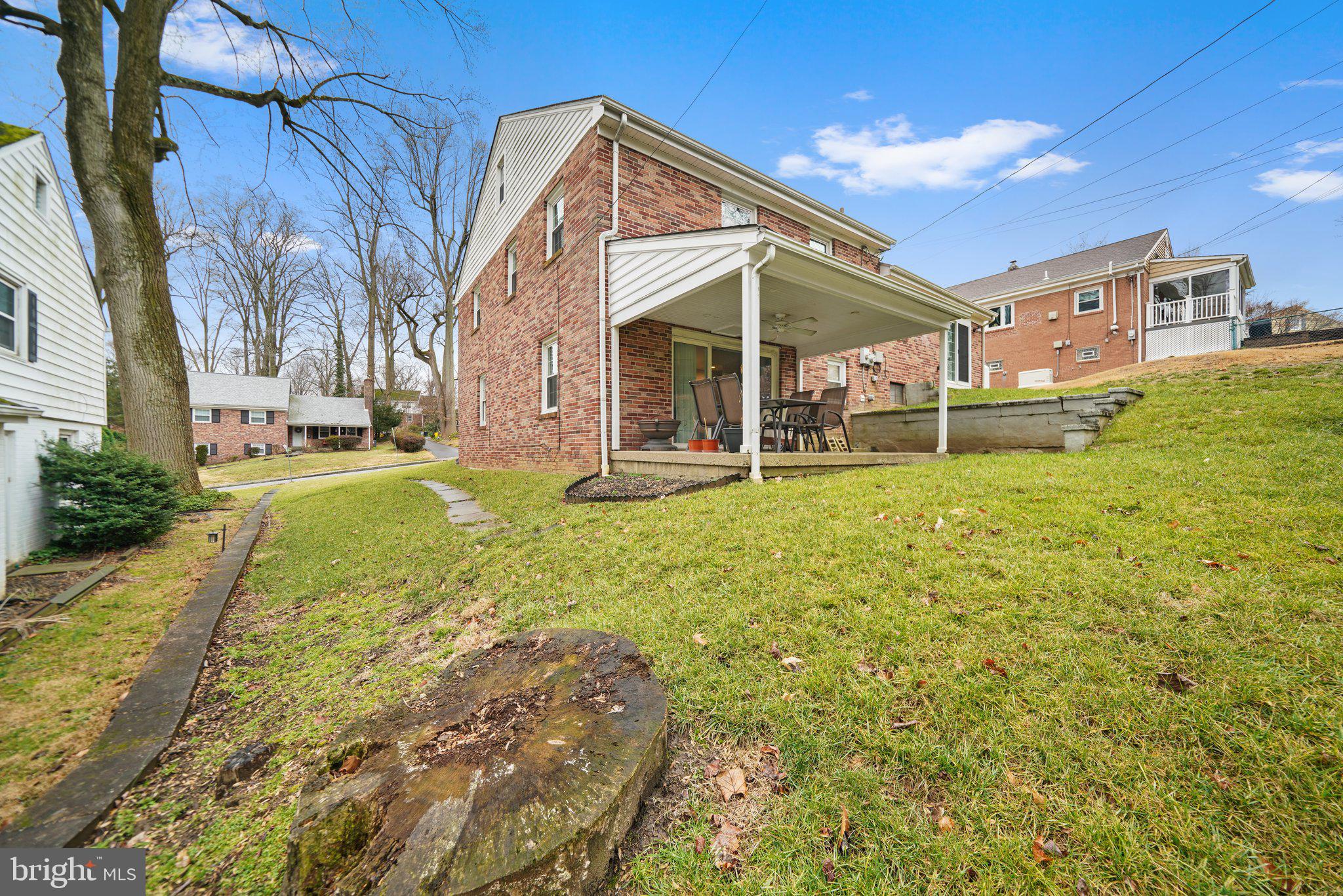 487 Kerr Lane Springfield, PA 19064 - Photo 33 of 48 a view of a house with a yard and sitting area