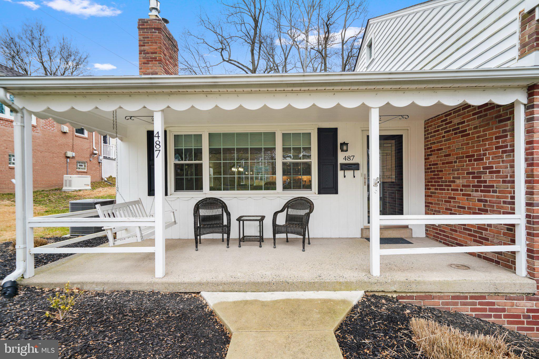 487 Kerr Lane Springfield, PA 19064 - Photo 5 of 48 a view of a patio with table and chairs