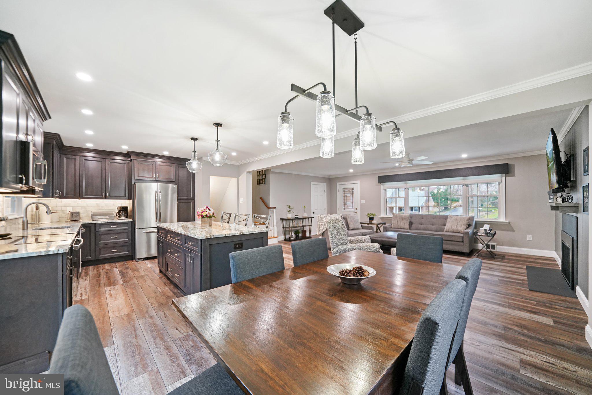 487 Kerr Lane Springfield, PA 19064 - Photo 7 of 48 a large kitchen with a table and chairs