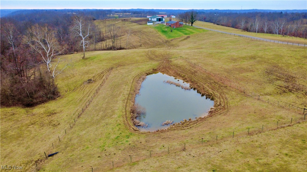 2242 South McCoy Ridge Road Stockport, OH 43787 - Photo 35 of 41 View of rural area featuring a large body of water