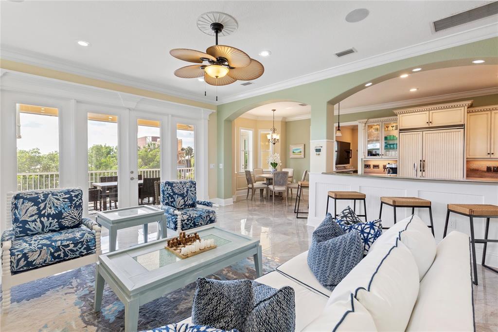 3523 West Shell Point Road Ruskin, FL 33570 - Photo 13 of 89 a living room with furniture kitchen area and a large window