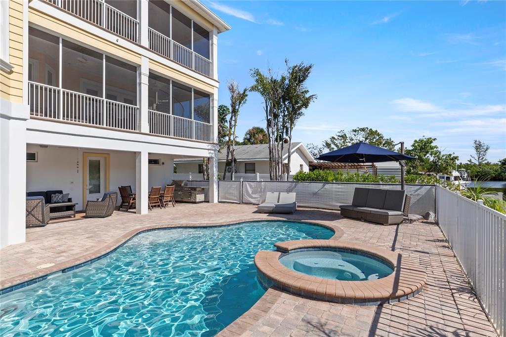 3523 West Shell Point Road Ruskin, FL 33570 - Photo 67 of 89 a swimming pool with outdoor seating yard and barbeque oven