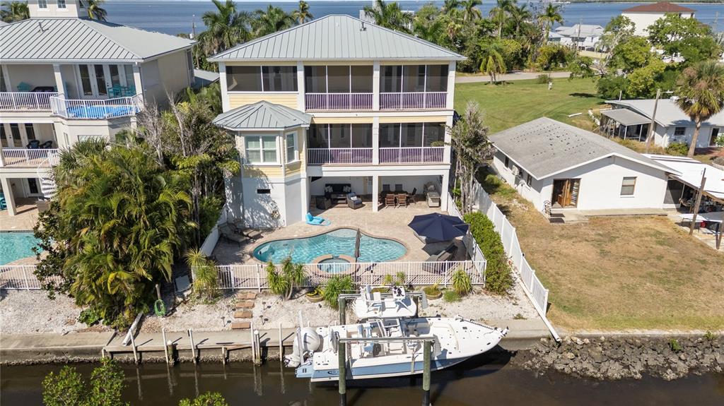 3523 West Shell Point Road Ruskin, FL 33570 - Photo 74 of 89 a aerial view of a house with a yard
