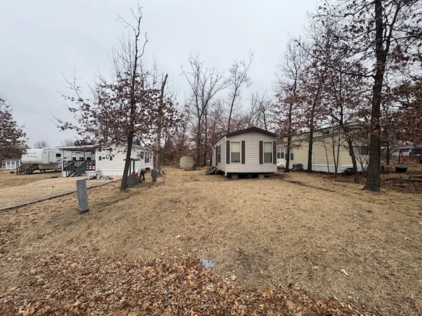 a house with trees in front of it