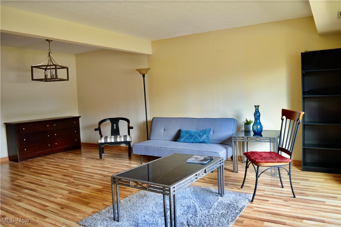 3257 Mayfield Road Cleveland, OH 44118 - Photo 5 of 20 Living area with wood finished floors and baseboards