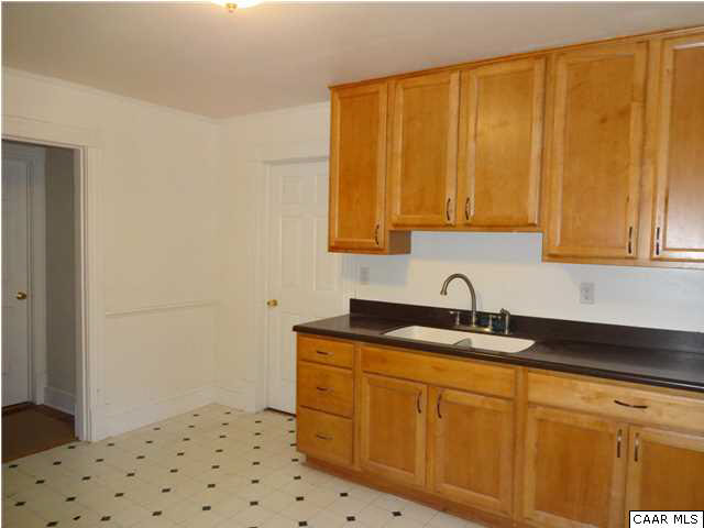 566 Half Mile Branch Road Crozet, VA 22932 - Photo 6 of 19 a kitchen with a sink and cabinets