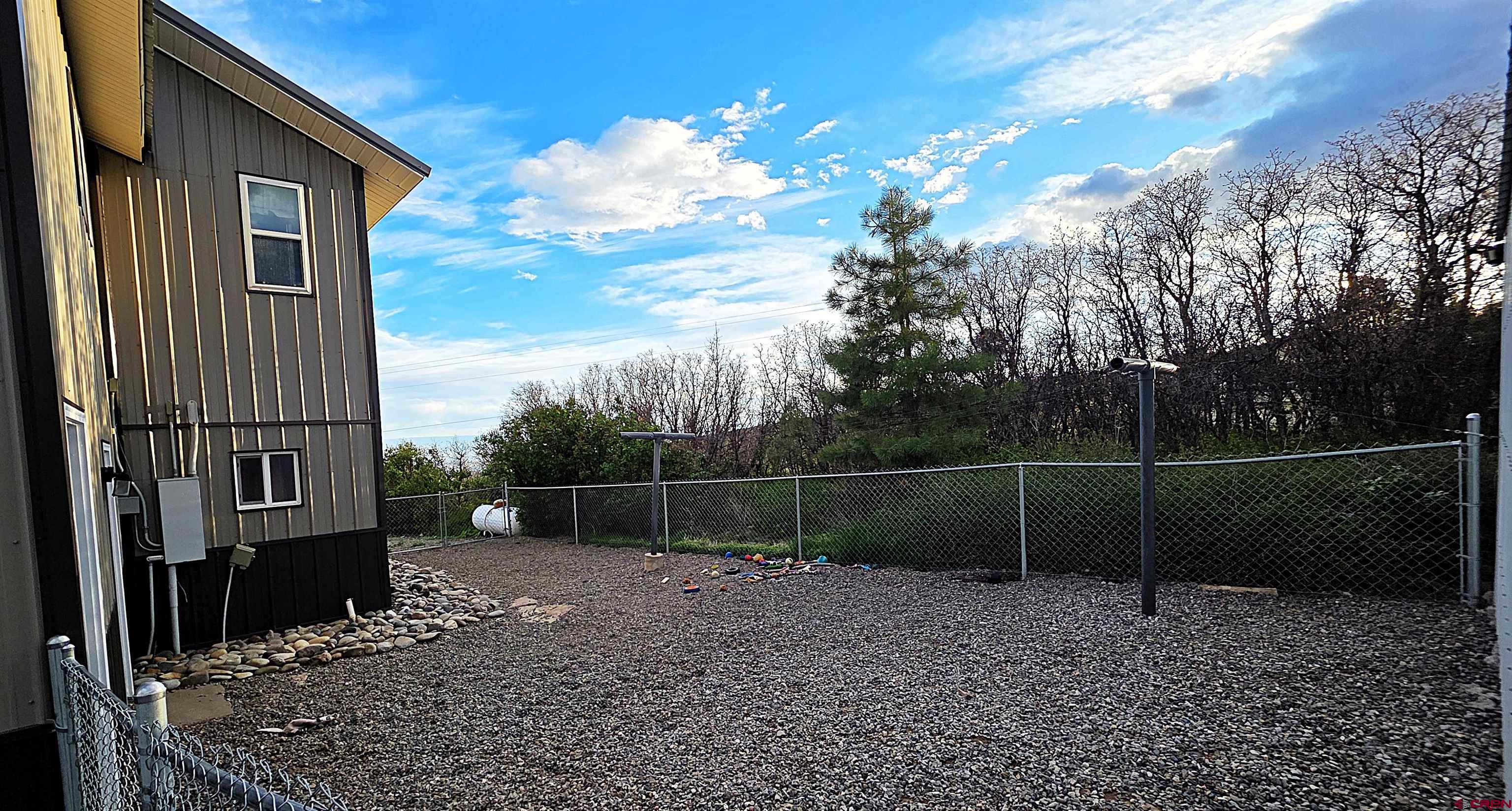 21976 2225th Road Cedaredge, CO 81413 - Photo 24 of 36 a backyard of a house