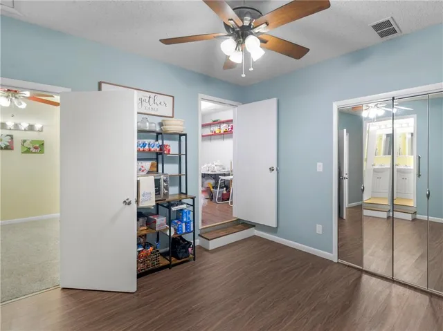a view of a livingroom with wooden floor