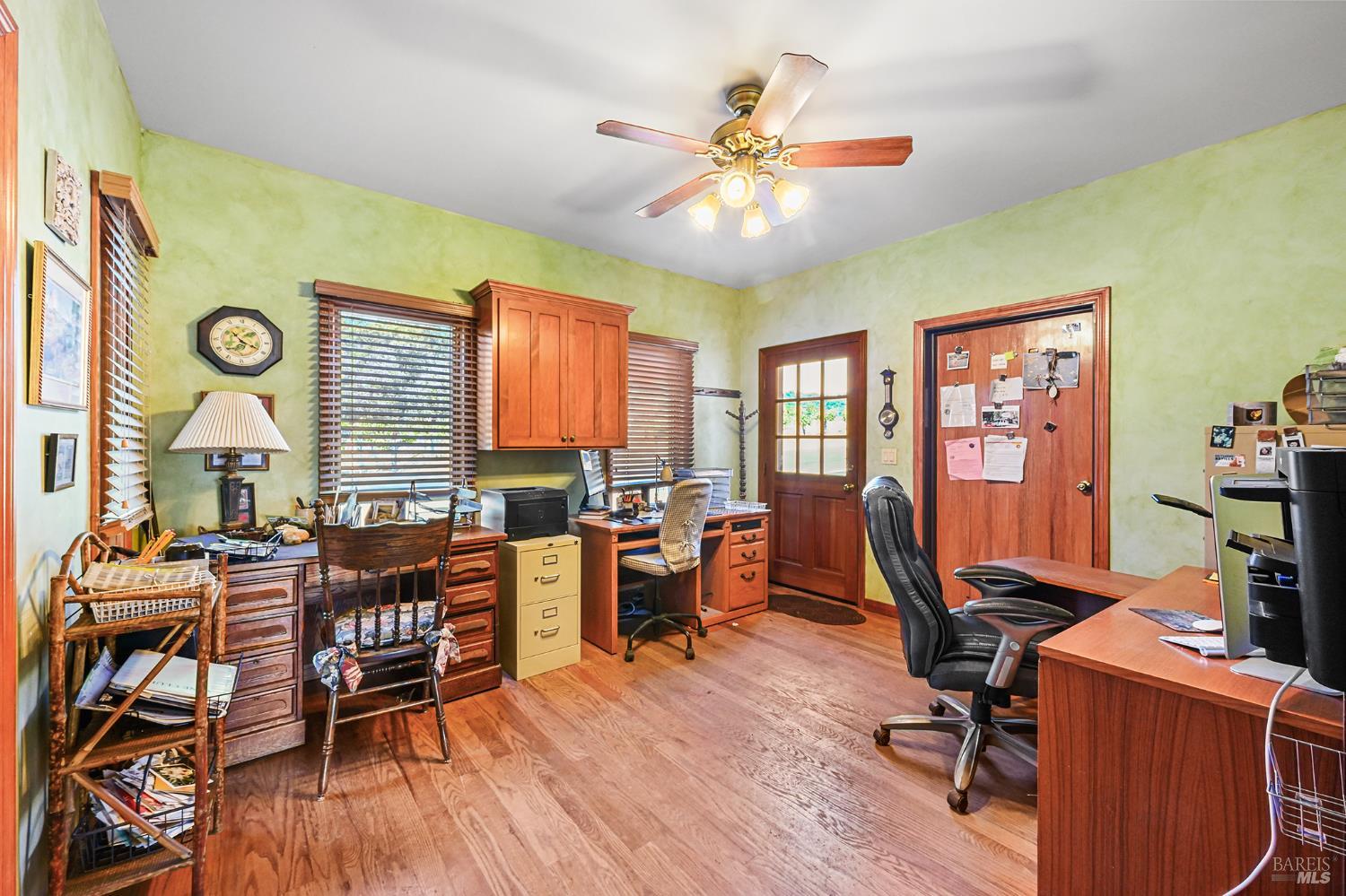 5143 Dry Creek Road Healdsburg, CA 95448 - Photo 52 of 85 a view of a workspace with furniture and a window