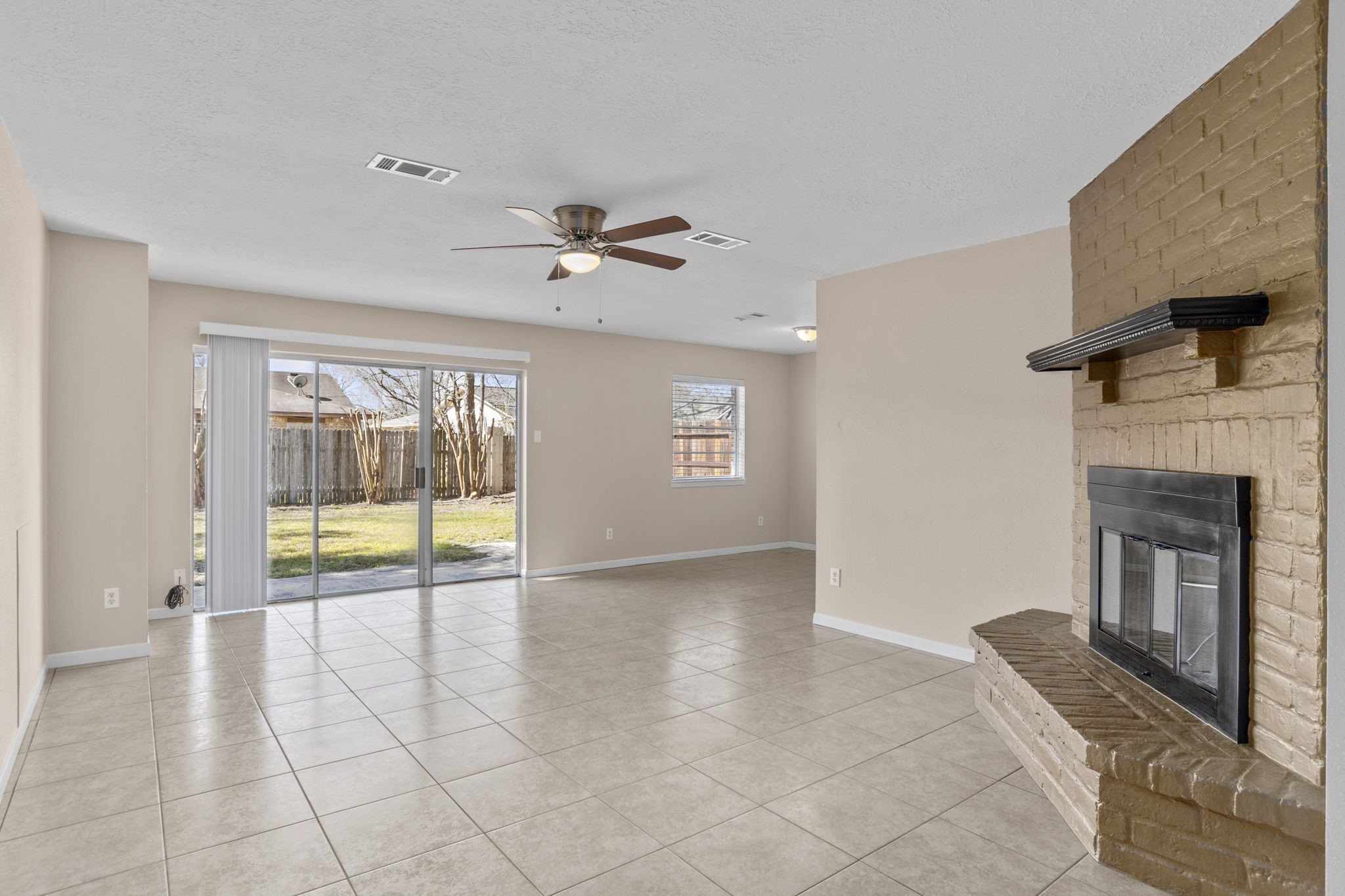 2127 Union Mill Road Houston, TX 77067 - Photo 5 of 19 (sliding glass patio doors have been replaced with new French / double-doors)