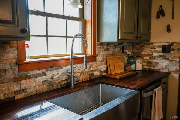 a kitchen with a stove and a microwave