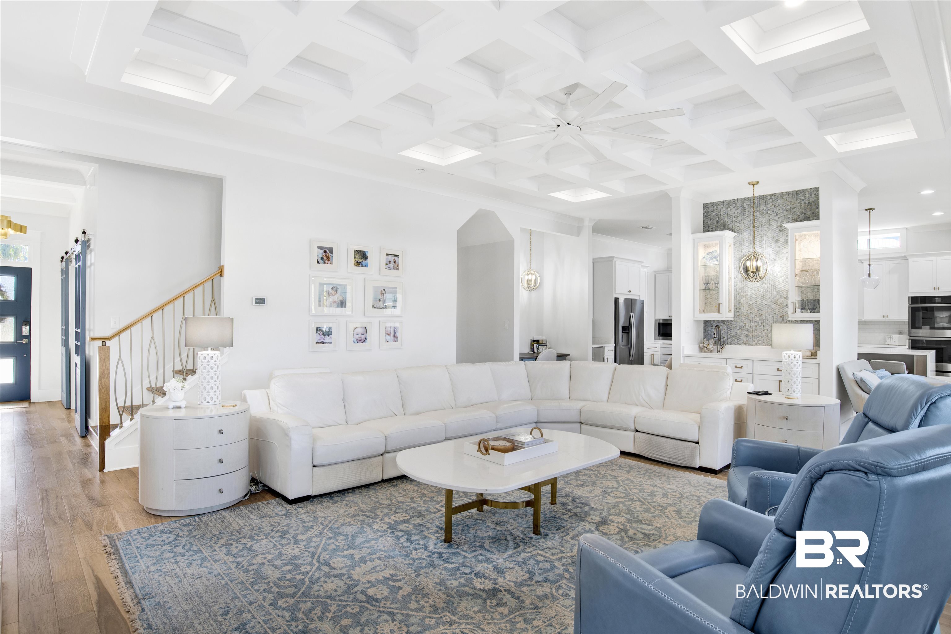 32937 River Road Orange Beach, AL 36561 - Photo 7 of 42 Living room featuring beam ceiling, light wood-type flooring, and coffered ceiling