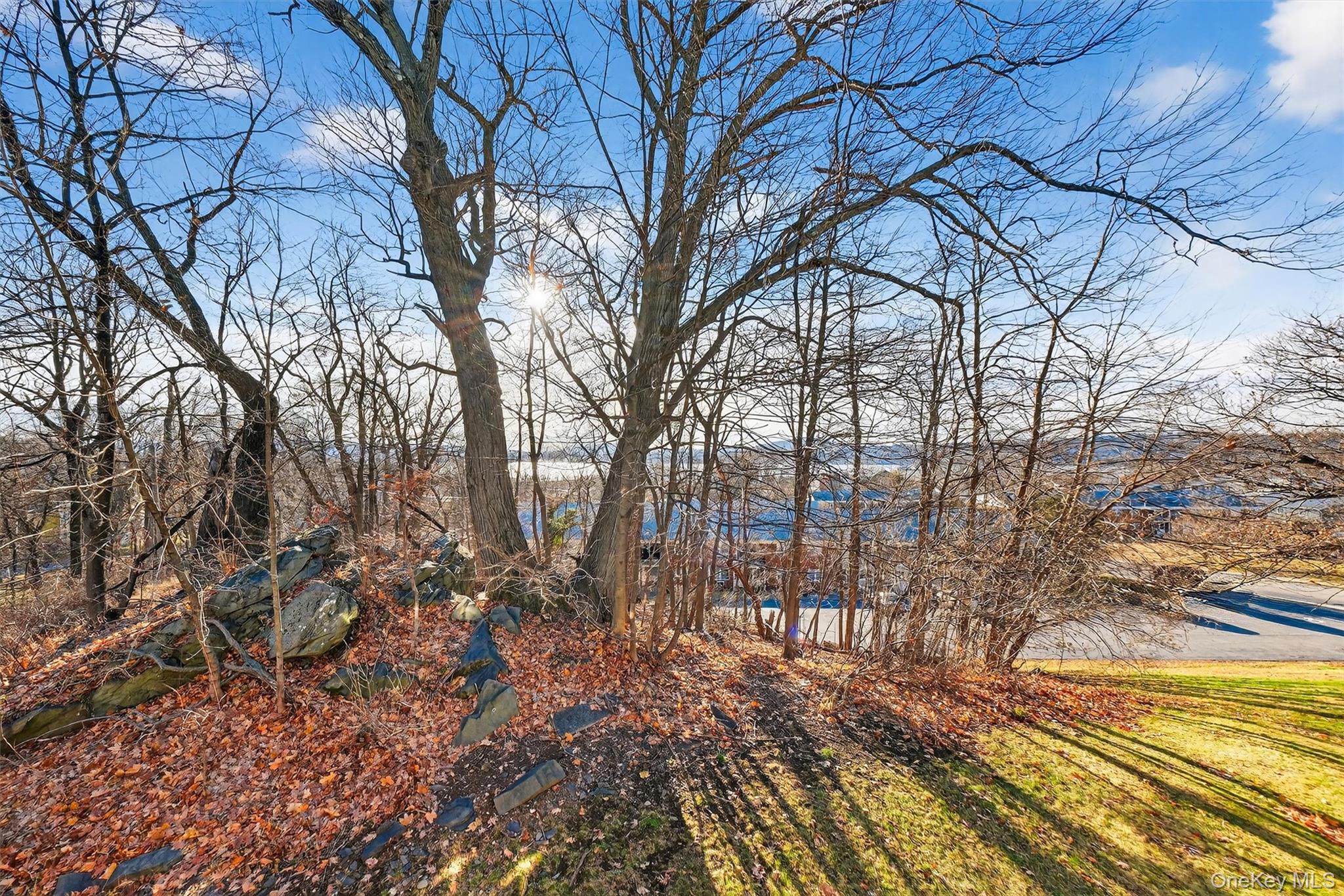 4 Colonial Road, Unit 96 Beacon, NY 12508 - Photo 16 of 17 a backyard of a house with lots of green space