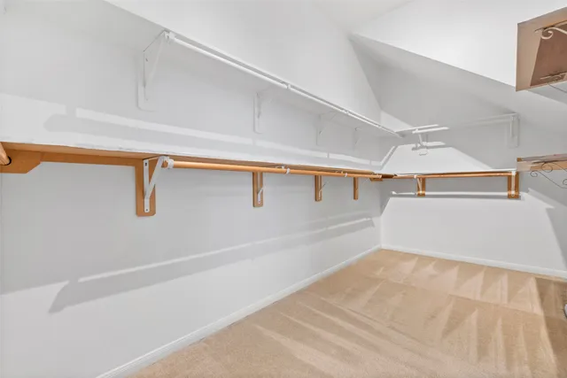 a view of a small space with wooden floor