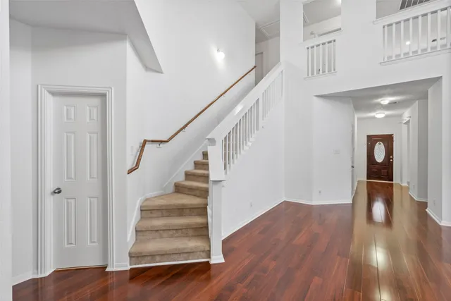 a very nice looking room with wooden floor