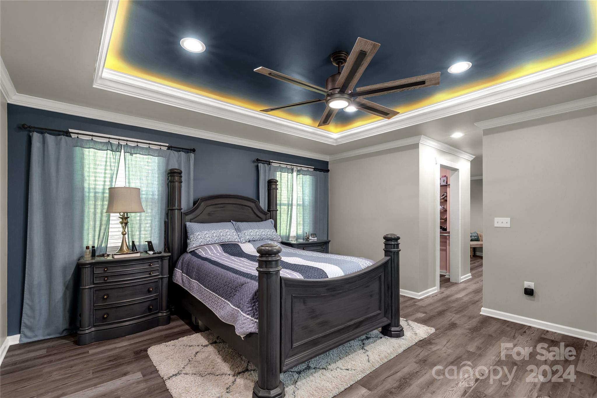 3593 Taxahaw Road Lancaster, SC 29720 - Photo 11 of 23 a bedroom with a bed and a chandelier