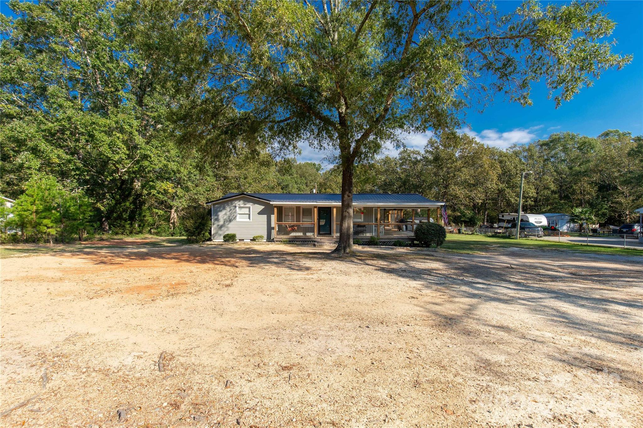 3593 Taxahaw Road Lancaster, SC 29720 - Photo 2 of 23 a view of a house with a yard