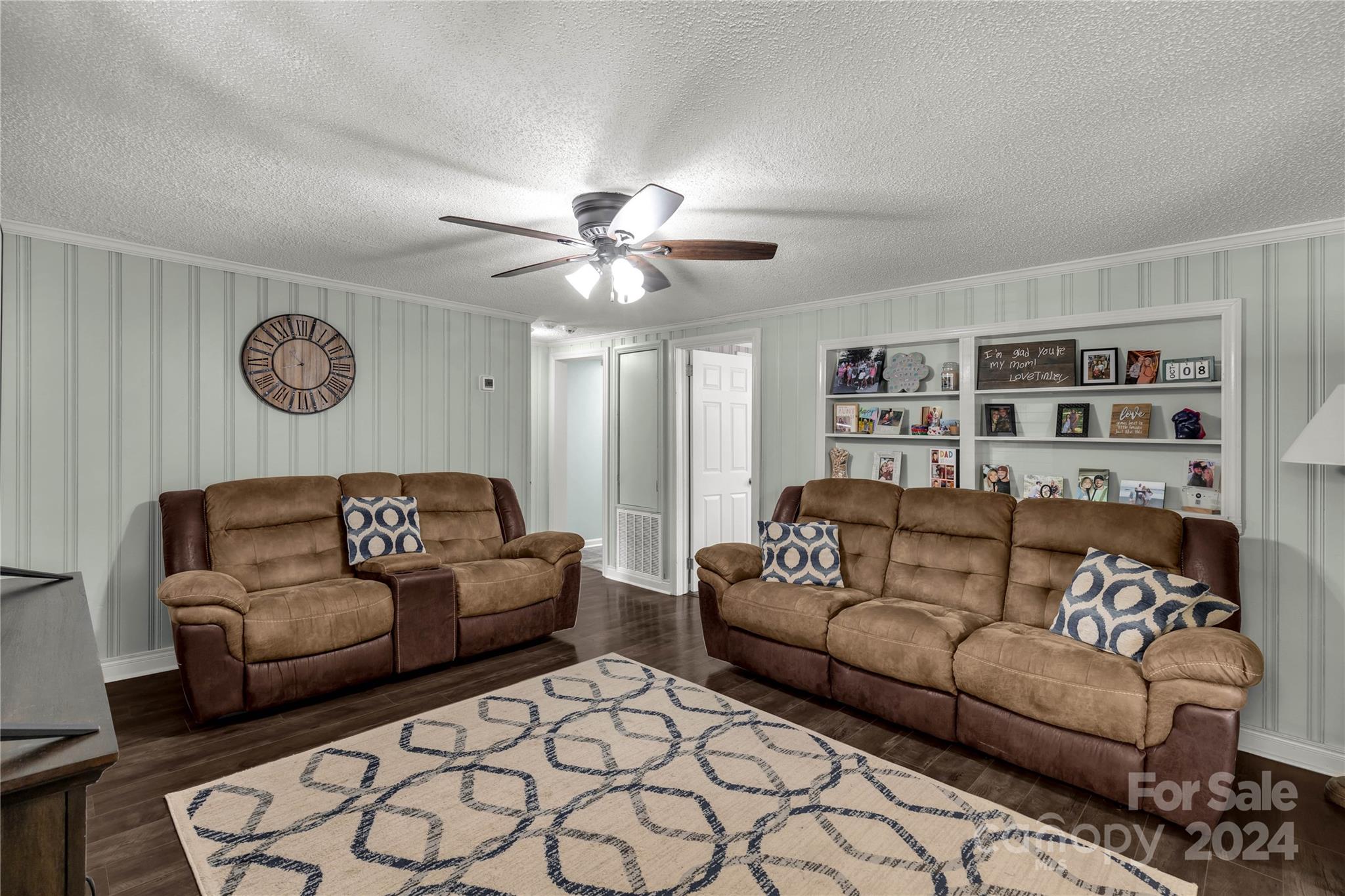 3593 Taxahaw Road Lancaster, SC 29720 - Photo 4 of 23 a living room with furniture and a clock