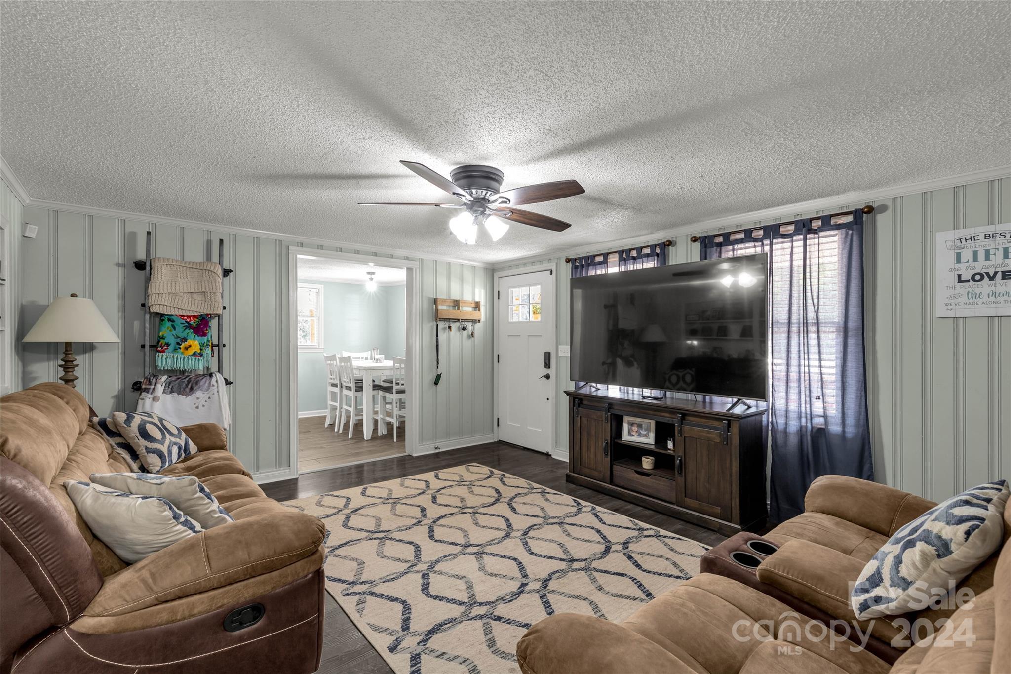 3593 Taxahaw Road Lancaster, SC 29720 - Photo 5 of 23 a living room with furniture and a flat screen tv